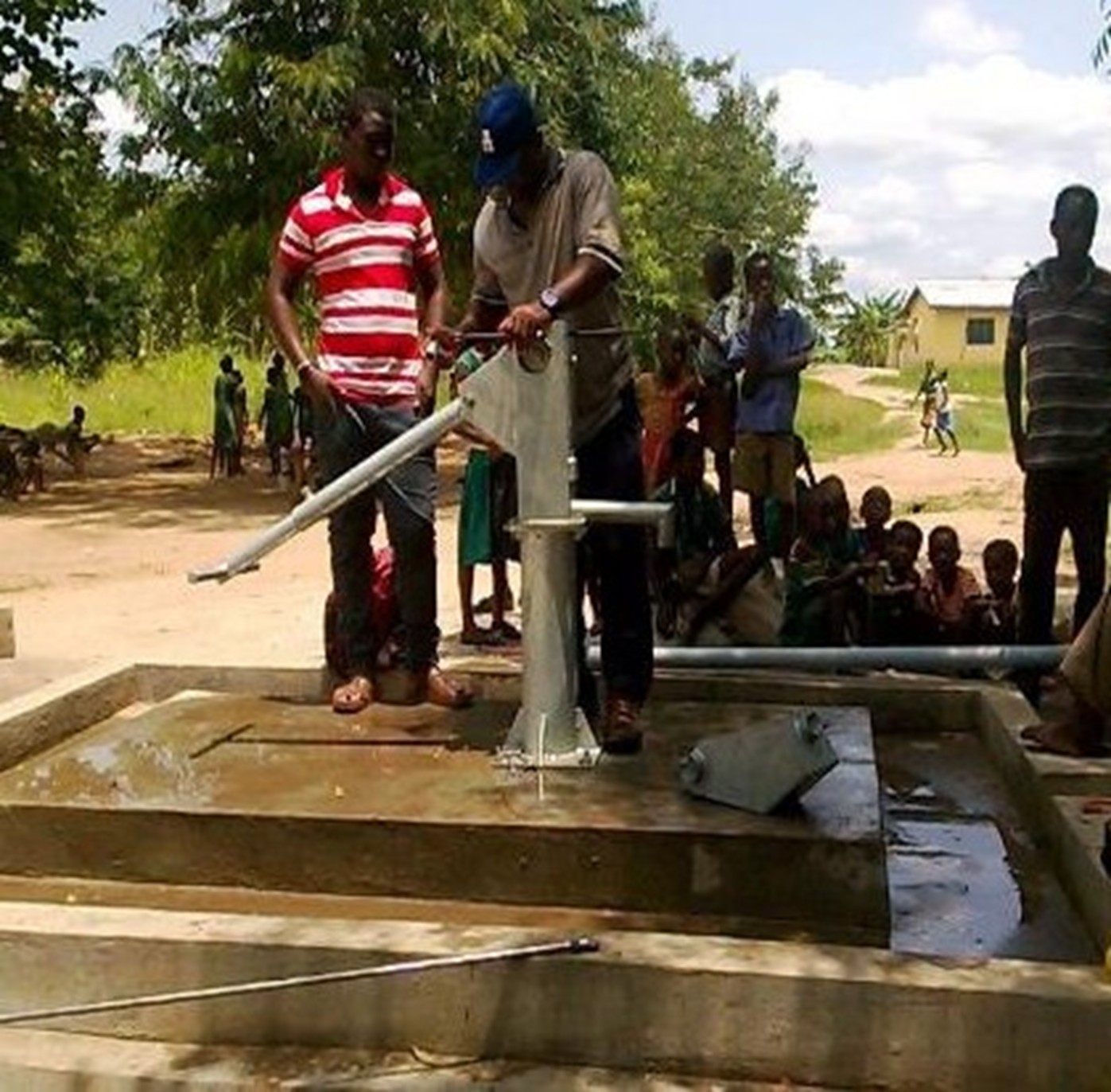 Hand Pump With Concrete Pad